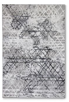 an abstract rug with black and white designs