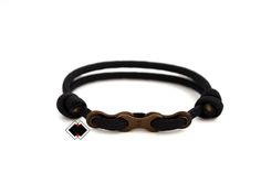 "You'll love this minimalist bracelet fashioned from 100% Mil-spec 550 american paracord with a stainless steel bike chain. This bracelet is one-size-fits-all so sizing isn't an issue. Slide over your hand and with tugging the knots you'll have a great fit. ----------------------------------------------------- If you pick the option \"custom send us note\" please leave a note with your checkout and let us know the color from our \"chart color\" (pictures on listing) that fits you best. --------- Durable Black Paracord Bracelets, Casual Black Braided Bracelets For Outdoor, Handmade Black Braided Bracelets For Outdoor, Adjustable Black Braided Bracelet For Outdoor, Casual Black Paracord Bracelet, Paracord Armband, Steel Bike, Black Bike, Bike Chain