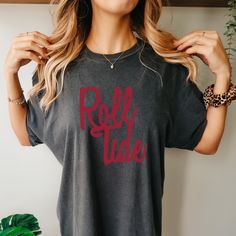 *Also available as a sweater. See below.* Support your team in style with our Roll Tide Alabama Football T-Shirt! This shirt is perfect for game day and beyond. Let this playful and friendly shirt show off your team spirit. School Spirit T-shirt For Game Day, Relaxed Fit, Tri-blend Fan Apparel T-shirt For Game Day, Pre-shrunk Relaxed Fit T-shirt For Game Day, Game Day Team Spirit T-shirt With Relaxed Fit, Team-colored Screen Print T-shirt For Game Day, School Spirit T-shirt Relaxed Fit For Game Day, Relaxed Fit T-shirt For Game Day With School Spirit, Game Day Team Spirit T-shirt With Screen Print, Game Day Sports Fan T-shirt With Relaxed Fit