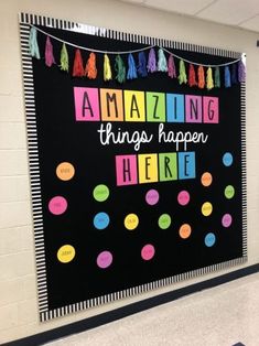 a bulletin board with the words amazing things happen here