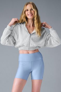 A cozy classic with a shrunken silhouette, the Sweet Escape has a hood, a front zipper, ribbing at the cuffs and a waist-grazing hem. The pocketless design creates a streamlined fit, and the seamed details along the back and arms elevate the look for outside-the-house adventures. Plus, it’s all made from our soft, smooth, incredibly comfy Accolade fabric. Stretch Hoodie With Ribbed Waistband For Winter, Fall Athleisure Hoodie With Ribbed Waistband, Fall Athleisure Hooded Jacket With Ribbed Cuffs, Cozy Hoodie With Ribbed Waistband For Fall, Fall Stretch Hoodie With Ribbed Waistband, Fall Long Sleeve Tops With Zip Cuffs, Cozy Fit Athleisure Hooded Jacket For Fall, Athleisure Cozy Fit Hooded Jacket For Fall, Cozy Stretch Outerwear With Ribbed Cuffs