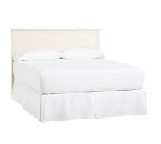 a bed with white linens and pillows on top of the headboard, against a white background