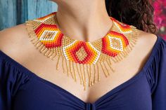 Traditional geometric design, approximately 45 cm long 6 cm wide and its 13 cm in its widest area (including the fringe). Festival Multicolor Large Beads Necklace, Rbg Beaded Collar Pattern, Traditional Multicolor Beaded Fringe Necklaces, Huichol Pattern Design, Huichol Necklace Pattern, The Fringe, Blue Bracelet, The Girl Who, Brown Gold