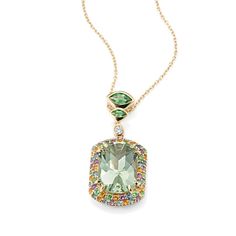 This bold pendant features an array of natural gemstones. A green quartz gemstone is at the heart of the design  while topaz  amethyst  tsavorite  and citrine accents form a colorful halo. Additional tsavorite and diamond accents on the bail round out this unique 14-karat yellow gold necklace. Luxury Gemstone Chain Necklace In Fine Jewelry Style, Luxury Gold Diamond Necklace With Gemstone, Luxury Green Amethyst Gemstone Necklace, Elegant Green Multi-stone Gemstones, Fine Jewelry With Green Amethyst, Yellow Gold Necklace, Halo Pendant, Green Quartz, Pendant Design