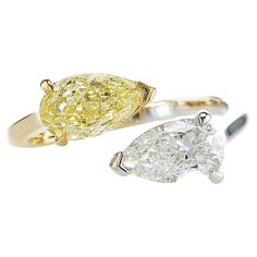 Very young and schick coctail ring. Two beatiful gia certified natural diamond in the form of drops The nice combination of white and fancy light yellow diamonds Fancy Light, Yellow Diamonds, Fancy Lights, Fancy Color Diamonds, Yellow Diamond, Light Yellow, Cocktail Rings, Colored Diamonds, Natural Diamonds