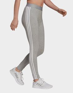 Clean, minimalist design inspires this everyday essential. Contrast 3-Stripes and a logo keep these women adidas leggings rooted in simple sporty style. Stretchy cotton makes them feel soft and comfortable.• Regular fit• 93% cotton, 7% elastane• 3-Stripes leggings Adidas 3 Stripes, Adidas Grey, Womens Adidas, Adidas Leggings, Timeless Wardrobe Staples, Timeless Wardrobe, Striped Leggings, Grey Adidas, Jd Sports