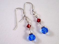 "These patriotic earrings which I call Patriot are made with siam (red), sapphire (blue) and clear (white) top quality name brand crystals, bali silver and sterling silver. They dangle from sturdy sterling silver french hook earwires and measure 1.5\" from the top curve of the earwire to the bottom of the faceted round crystal. What a great way to show your love of country or of all things nautical and still satisfy your love of bling! Please feel free to ask me any questions you may have about Silver Jewelry For 4th Of July Gift, Silver Jewelry Gift For 4th Of July, Blue Ear Wire Jewelry For 4th Of July, Handmade Patriotic Silver Jewelry, Patriotic Blue Earrings For Gift, Patriotic Dangle Jewelry For Gifts, Blue Patriotic Beaded Earrings As Gift, Patriotic Drop Earrings Jewelry Gift, Handmade Patriotic Dangle Earrings