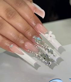 Blinged Out White French Tip Nails, Long White Nails With Charms, Long White French Tip Nails With Rhinestones, Long White French Tip Nails With Gems, Silver Chrome French Tip Nails With Charms, White French Tip Nails, Historical Tattoos, Extra Nails, Nails Bling