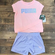 2pcs Kids Set By Puma Includes: Purple Shorts And A Peach Pink T-Shirt With The Puma Logo. Available In Similar Styles - Check Out My Closet! Bundle And Save. Same/Next Day Shipping! Pink Short Top For Playwear, Short Pink Tops For Playwear, Pink Cotton Activewear For Playwear, Purple Cotton Activewear For Spring, Puma Outfit, Puma Logo, Purple Shorts, Kids Set, Levi Jeans 501