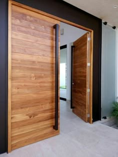 an open wooden door leading to another room