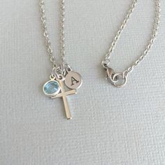 Personalized Cross Necklace, Religious Necklace, Baptism Necklace, Initial Necklace, First Communion Gift, Catholic Necklace, Hand StampedThe aluminium and stainless steel I use is 100% Hypoallergenic. It will not cause skin reactions or tarnish over time. It is perfect for people with sensitive skin and for everyone else!The advantage of aluminium is lightweight and anti tarnish! It's very comfortable and perfect for daily wear.♥ This listing includes:. 3/10" or 7mm stainless steel disc. 19mm x Silver Cross Necklace For Confirmation, Silver Cross Jewelry For Confirmation, Silver Engraved Necklace For First Communion, Engraved Silver Necklace For First Communion, Silver Cross Necklaces With Name Detail, Silver Cross Pendant Necklace With Name, Silver Name Necklace With Cross Pendant, Silver Cross Jewelry With Name, Silver Name Necklace With Cross Shape