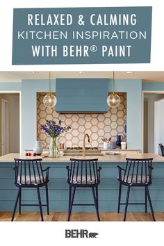 a kitchen with blue cabinets and white countertops is featured in the behr magazine