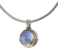 Moon Phase Moonstone Jewelry, Round Moonstone Necklace With Natural Stones, Round Moonstone Crystal Necklace With Natural Stones, Elegant Crescent Moonstone Jewelry, Elegant Moonstone Necklace With Moon Phase, Moonstone Gemstone Crystal Necklace With Round Pendant, Mystical Round Moonstone Jewelry, Moonstone Crystal Necklace With Moon Phase, Moonstone Jewelry With Moon Charm