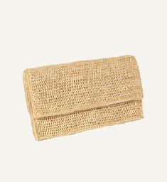 A summer and resort favorite, The Zoe Report named our Edgartown Clutch a must have bag and we don't go on vacation without it. It looks just as chic dressed up with a cotton dress as it does with a casual linen shirt and wide leg linen pants. Classic raffia envelope clutch with an inside open pocket and cotton lining, snap closure. 13" by 7.5" by 1". Raffia. Made in Madagascar. Casual Neutral Summer Straw Bag, Versatile Rectangular Summer Straw Bag, Versatile Rectangular Straw Bag For Summer, Casual Neutral Straw Bag For Spring, Spring Vacation Cotton Straw Bag, Chic Woven Straw Bag For Summer Outings, Versatile Beige Straw Bag For Summer, Chic Woven Bag For Summer Outings, Versatile Summer Beach Straw Bag