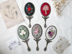 ★ Hand-embroidered Compact Mirror - Materials: Stainless steel, linen, yawn - Size: Diameter 70mm. Mirror inside: 57mm - Weight: 0.28 lbs / 80g - Comes with a lovely floral pouch to keep the mirror. It also makes perfect gift for your beloved women: wife, girlfriend, mom, sister, bridesmaid. Aesthetic Bridesmaid, Bridesmaid Mirror, Floral Pouch, Sister Bridesmaid, Foldable Mirror, Her Aesthetic, Folding Mirror, Pocket Mirrors, Mirror Vintage