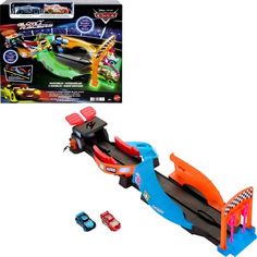 a toy race track set with cars and tracks in the box on a white background