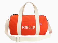 Please contact me for medium-size and mini-size duffel bag options. The default size is medium.   Introducing our Orange Personalized Cotton Duffle Bag, a stylish and practical accessory for all your travel and gym needs. Made from premium quality cotton canvas, this duffle bag is both durable and lightweight. The bright orange color adds a pop of color to your outfit and makes it easy to spot your bag among others. The bag features a spacious main compartment, perfect for storing all your essen Casual Orange Sports Bag, Functional Orange Sports Bag, Sporty Red Everyday Bag, Sporty Rectangular Gym Bag For Weekend, Sporty Rectangular Duffle Bag For Weekend, Sporty School Duffle Bag With Adjustable Strap, Sporty White Duffle Bag For School, Sporty Rectangular Weekend Travel Bag, Casual Red Duffle Bag For Everyday