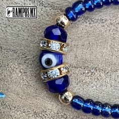 "Beautiful Mexican Handmade Woven \" Blue Evil Eye Symbol\" Kids and adults Unisex bracelet \"Mal de Ojo\" with the company of San Benito Symbol is Handmade braided Design by our Artisan Team to create a beautiful Stylish ,protection and positive accessory , definitely a must have in your religios Collection :) ( One bracelet per order) Color can change slightly depending on the device screen thats been viewed on. Bracelet has and adjustable : kids Unisex and adult :One size Fits All Unisex Braz Weaving For Kids, Eye Symbol, Red String Bracelet, Red String, Woven Bracelet, Blue Evil Eye, Unisex Bracelets, Woven Bracelets, Blue Eye