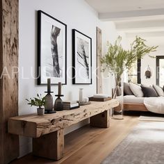 a living room filled with furniture and pictures on the wall