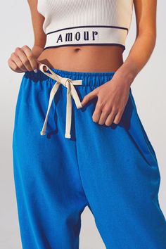 Stay comfy and stylish with these Blue Oversized Joggers with Tie Waist from Szua Store. Made with 100% cotton, these joggers are perfect for a casual day out or lounging at home. Fabric & Fit: 100% cotton Model is wearing size U Runs true to size Relaxed fit for a comfortable and easy-to-wear look Full length for a classic style Sweatshirt fabric for a cozy feel Model Info: Measurements: 31-22-34 Height: 5' Key Features: Jogger style for a casual and laid-back look Straight leg for a versatile Sweatshirt Fabric, Blue China, Fashion Joggers, Knitwear Tops, Casual Everyday, Sweatshirt Dress, Belted Dress, Alternative Fashion, High Waisted Pants