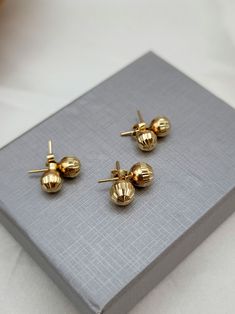 18K Gold Ball Push Back Stud Earrings. Diamond-cut! The earrings are available in 6-8mm (millimeters) wide choice! * 7mm  grams weight: 1.48 gr lengths: 18mm width: 7mm * 8mm  grams weight: 1.93 gr lengths: 18mm width: 8mm * 18k gold will not oxidize or discolor, so you can wear your jewelry every day, everywhere. ➡️ Priced to sell! Please compare our prices to other similar sellers! * I am pleased to offer complimentary shipping to all over the world. * Your order will be ready for shipment in 1-3 business days. * All my creations are carefully wrapped in an elegant case. * I take absolute care of precious jewels are packed well so that there is no damage to the product. * All items will be shipped to you with a certificate of gold purity and authenticity of Karat. ➡️ Returns: Your satisf Formal Polished Sphere Earrings, Gold-tone Polished 14k Gold Earrings, Gold Sphere Single Earring, Gold Ball Stud Earrings, 14k Yellow Gold Diamond Earrings, Tarnish Resistant, Beaded Ball, Ball Stud Earrings, Ball Earrings, Yellow Gold Earrings