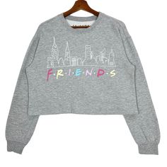 Friends 90s US Tv Series Cropped Short Crewneck Sweatshirt Jumper Grey Size Small * Made in : China * Size on Tag : Small (S) * Manual Measurement (inch) : Chest 21.5, Length 18, Shoulder 20.5, Sleeve 20.5, Hem 22. * Recommended for Size : Small (S) * Material : Cotton, Polyester, Spandex. * Colour : Grey * Condition : Excellent  * See photos for details. * Free Defect : No Stain, No Holes, No Tears, No Faded. 5321 90s Inspired Crew Neck Top For Fall, 90s Style Crew Neck Top For Fall, 90s Inspired Long Sleeve Letter Print Tops, 90s Inspired Long Sleeve Top With Letter Print, 90s Inspired Long Sleeve Graphic Print Tops, 90s Inspired Long Sleeve Graphic Top, Friends 90s, Womens Sweatshirts, Grey Sweatshirt