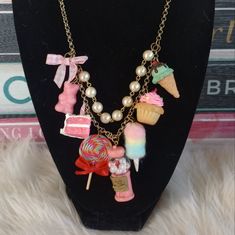 * Handmade Candy Statement Charm Necklace ***Please Note This Was Not Handmade By Me*** * Adorable Kitschy Charms: Mint Ice Cream Cone, Pink Birthday Cake, Rainbow Swirly Lollipop, Gumball Machine, Pastel Cotton Candy, Gummy Bear And Finished With A Pink Gingham Bow And Faux Pearl Accents * Good Pre-Owned Condition. The Chain Does Have Some Tarnishing/Discoloration * Shipped Safely Inside A Generic Gift Box *** Matching Bracelet In A Separate Listing *** Kitschy Jewelry, Swirly Lollipop, Birthday Cake Rainbow, Pastel Cotton Candy, Candy Gummy, Cake Rainbow, Pink Birthday Cake, Aesthetic 2024, Mint Ice Cream