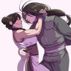 two people are hugging each other in an animated style, one is wearing a purple dress and the other has black hair