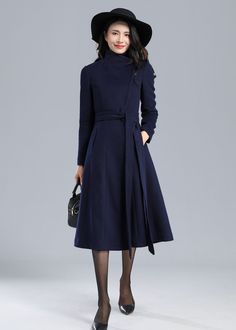 "★★ FEATURES 50% wool, other fiber,nylon Polyester lining Two side pockets Snap closure Belted wool coat Long sleeve A Line coat Perfect for winter, autumn Dry clean Fabric swatch https://etsy.me/3yprD9Q Size Chart https://etsy.me/3skS1Aq ★★Mode size Height 170cm (5′ 7″) Bust 84 cm (33\") Waist 66 cm (26\") She wears size XS. ★★ Custom order selection, Will charge 20USD-70USD custom fees Request other color Request Chang the Length Request Chang the sleeve length Your height is not between 155cm A-line Wool Outerwear For Work, Wool A-line Outerwear For Work, Chic A-line Wool Coat For Work, Stand Collar Wool Coat For Office In Fall, Fall Wool Coat With Stand Collar For Office, Office Wool Coat With Stand Collar For Fall, A-line Winter Outerwear For Work, Fall Office Wool Coat With Stand Collar, Chic A-line Wool Coat For Fall