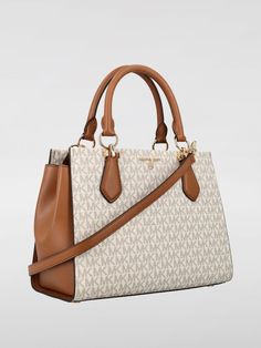 Find MICHAEL KORS Satchel on Editorialist. This MICHAEL MICHAEL KORS satchel features a logo pattern, top handle, and an adjustable strap that can be worn on the shoulder. The bag has a flap open closure, and a push lock detail. Cream Handbag, Michael Kors Satchel, Michael Kors Handbag, Logo Pattern, Handbags Michael Kors, Signature Logo, Woman Colour, Chain Strap, Top Handle