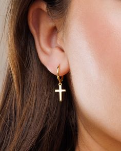 Meet our lovely cross hoops! Classic and minimal, perfect for any occasion and for your everyday wear since they are so dainty and timeless. Stack it with our other hoops and studs to create your own personal and unique look!  DETAILS * Material : 18K Gold on Brass / Sterling Silver. * Special anti-tarnish protective coating. * Handcrafted with love in our studio. * Comfortable and lightweight.  * Hoop Inner Diameter : 9mm * Cross Size : 10mm * Sold in pairs.   PACKAGING & GIFTS We will package your order in a beautiful gift box :) * You can also gift the jewelry straight to your loved one!  * If you are purchasing multiple items, we will package them together in the same box.  * If you need separate boxes, please leave us a note at checkout. Thank you for visiting our shop! If you have qu Minimalist Cross Pendant Earrings, Minimalist Hypoallergenic Cross Earrings, Cross-shaped Huggie Earrings For Gift, Dangle Cross Earrings, Earrings Cross, Necklace Clasps, Gold Filled Earrings, Earrings Minimalist, Cross Bracelet