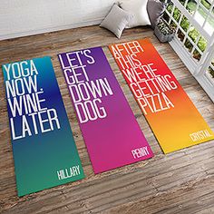 yoga mats with the words yoga now, wine later, and let's get down dog written on them