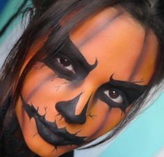 17 Pumpkin Face Paint Ideas You'll Want To Try! - The Mummy Front Pumpkin Face Halloween Makeup, Face Paint Ideas For Adults, Cute Pumpkin Makeup, Pumpkin Face Makeup, Jack O Lantern Makeup, Horror Smink, Halloween Makeup Pumpkin, Jack O Lantern Costume, Pumpkin Makeup