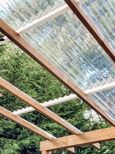 the inside of a house being built with plastic sheeting on it's roof