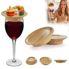 a woman holding a wine glass next to some wooden plates