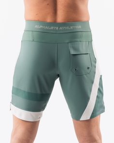 HIGHLIGHTS.. Unlined boardshort. 9” inseam Reflective branding at leg opening and back waistband Elastic waistband with adjustable self-tie drawcords Color-blocking panelling Water resistant fabric FIT SUGGESTION. This item runs true to Alphalete’s standard sizing.. Fit is based off of waist size in inches.. If you are between sizes, we recommend sizing up for a relaxed fit.. Eric is 6’2”/188cm, wearing a size 32. MATERIALS AND WASHING DIRECTIONS. 67% Nylon, 23% spandex. Due to the high saturati Aztec Shorts, Tank Top Bras, Black Accessories, Water Resistant Fabric, Waist Size, Tank Top Shirt, Color Blocking, Sports Bra, Highlights