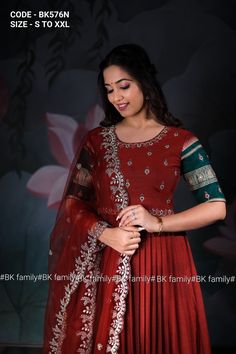 Experience the softness and comfort of cotton handloom fabric paired with a sparkling Green and red color combination. This half sleeve red piece is embellished with intricate gold maggam work in the yoke and sleeve. It features a matching net embroidered dupatta to complete the look. Celebrate the festival's love with this beautiful Anarkali set!* *Code-BK576N* *Size - S to xxl* *Anarkali Fabric: Cotton Handloom* *Dupatta Fabric: Net* *Work: Mirror and zardoshi Handwork* *Neckline: Round Shape Floor-length Gown With Dori Work For Diwali, Semi-stitched Embroidered Gown In Chanderi, Semi-stitched Embroidered Chanderi Gown, Semi-stitched Art Silk Gown With Dori Work, Embroidered Chanderi Gown For Diwali, Diwali Embroidered Chanderi Gown, Traditional Maxi Lehenga With Dori Work, Embroidered Chanderi Saree Gown, Embroidered Chanderi Gown For Eid