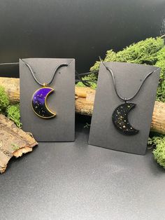 Gothic, Wicca and boho style  Moon Sparkle Pendants. Made out of Epoxy Resin with holographic glitter and real dried flowers. Add a bit of Sparkle and healing moon energy to your outfit. Can be Bought as a pair for friendship necklaces, mothers day present or even just as a gift for yourself. Perfect to accompany any outfit.  Necklace hangs to the middle of the chest. Leather cord is hypoallergenic and soft to wear. No nasty irritation or rashes. The Coated Frame is Durable and will last so long Mystical Necklaces For Halloween, Mystical Halloween Festival Necklaces, Mystical Halloween Festival Necklace, Handmade Magical Jewelry For Halloween, Halloween Moon Charm Jewelry As Gift, Magical Black Necklace For Gift, Mystical Necklace For Halloween Gift, Witchy Moon Phase Jewelry Gift, Mystical Halloween Necklace Gift