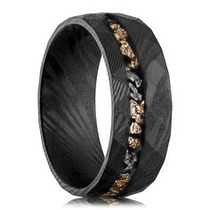 black and gold wedding band with an intricate design