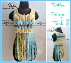 a crocheted vest with tassels on the front and back, made from yarn