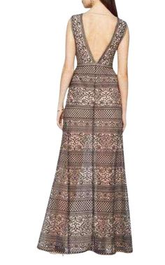 Detailed with panels of intricately embroidered lace, this stunning empire-waist gown with short sleeves vaunts a plunging neckline and graceful, floor-sweeping hemline. Concealed back zipper closure Fabric: 100% nylon tulle; Fabric 2: 100% polyester mesh; Lining: 91% polyester, 9% spandex Washable Mid-weight, non-stretch fabric Floor-length hemline True to fit Maxi Length Lace Gown With Sheer Bodice, Sheer Bodice Lace Maxi Gown, Lace Gown With Sheer Bodice In Maxi Length, Lace Gown With Sheer Bodice, Maxi Length, Lace Gown With Fitted Bodice And V-neck, V-neck Lace Back Evening Dress For Gala, Floor-length Scallop Lace Dress With Fitted Bodice, Floor-length Lace Bodice Dress For Gala, V-neck Lace Dress With Sweep Train