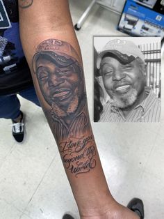 a man with a tattoo on his arm