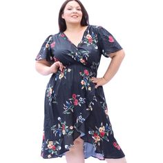 This Gorgeous Midi Dress Features A Ruffle Detail And Stunning Floral Print. Black Floral Short Sleeve Dress For Day Out, Black Flowy Floral Dress For Summer, Black Floral Dress With Short Sleeves For Spring, Black Short Sleeve Midi Dress With Ruffle Hem, Casual Black Floral Dress For Vacation, Black V-neck Floral Dress For Beach, Casual Black Maxi Dress With Ruffle Hem, Casual Black Floral Dress For Day Out, Black Ruffle Hem Maxi Dress For Brunch