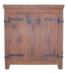 an old wooden cabinet with metal handles