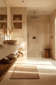 a bathroom with a sink, shower and bathtub in the middle of the room