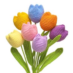 crocheted flowers are arranged on top of each other in the shape of hearts