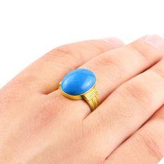 Metal: 14k Yellow Gold Turquoise*: 1.3cm x 1.8cm (0.5" x 0.7") shape - Oval cabochon setting type - Bezel setting *stone may vary in tone or pattern. Please allow for these natural variations. Product weight: 5.0 gr A delightful design for every occasion dressed in regal hues! Crafted from 14k gold, this gorgeous ring boasts a single blue turquoise stone. This piece will wrap around your finger with bold style so you can wear it anytime, anyplace ------------------------------------------------- Stone Ring For Men, Gold Rings Online, Stone Rings For Men, Turquoise Stone Ring, Turquoise Men, Brown Tiger Eye, 10k Gold Ring, Gorgeous Ring, Bold Style