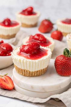 mini cheesecakes with strawberries on the side