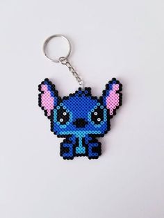 a beaded stitched keychain that looks like an animal