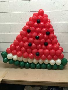 a christmas tree made out of balloons